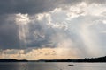 Vivid sunbeam light ray from clouds