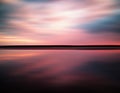 Vivid sunset sunrise horizon lake reflections landscape abstract Royalty Free Stock Photo