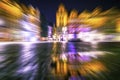 Vivid, tangled streaks of light. Poznan, old town - Market Square city night blurred lights, drugs like perceptions. Royalty Free Stock Photo