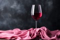 Vivid wine setting on black fabric background, top view with space for text, realistic presentation