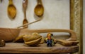 Vladimir, Russia - March 29, 2019: Funny bearded hipster lego-man minifigure with small souvenir spoon in Spoon Museum