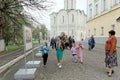 Vladimir, Russia. - May 06.2018. Tourists pilgrims and their children walk around Holy Dormition Cathedral.