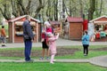 Vladimir, Russia. - May 06.2018. Tourists pilgrims and their children walk in the park Oaks.