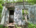 Vladivostok, Russia, June, 02, 2019. Destroyed barracks building with an extract from the order of Joseph Stalin on the wall on th