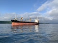 Vladivostok, Russia, 08.06.2019. Dry cargo ship Sokol 8 at anchor in the Amur Bay of the Japanese sea in the summer morning