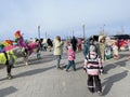 Vladivostok, Russia, January, 30, 2022. People walking along the Sports Embankment in sunny winter day. Vladivostok, Russia Royalty Free Stock Photo