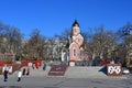 Vladivostok, Russia, January, 03, 2019. Tourists walk in front of the chapel in the name of St. Andrew and the memorial in memory