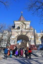 Vladivostok, Russia, January, 03, 2019. Tourists walking in front of the triumphal Nicholas arch of the crown Prince in sunny wi