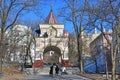 Vladivostok, Russia, January, 03, 2019. Tourists walking in front of the triumphal Nicholas arch of the crown Prince in sunny wi