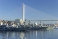 Warships of the Russian Pacific Fleet - cruiser, frigate and destroyer, at the pier in the center of Vladivostok