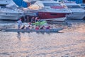 Vladivostok, Russia -Jul 01, 2020: groups of girls are taught rowing at sunset. Royalty Free Stock Photo