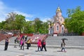 Vladivostok, Russia, May, 21, 2019. Tourists visiting the chapel in the name of St. Andrew and the monument in memory of the soldi