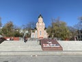 Vladivostok, Russia, October, 27, 2019. Tourists walking in front of the chapel in the name of St. Andrew and the memorial in mem