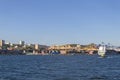 Large cargoes stacked on freighters and dock