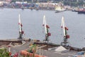 Portal cranes on the berth for bulk cargo and scrap metal of the commercial port of Vladivostok