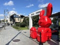 Vladivostok, Russia, September, 04, 2023. Sculpture of a large red hare on the Border street next to the square of the twin cities