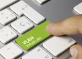 VLAN virtual LAN - Inscription on Green Keyboard Key