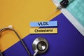 VLDL Cholesterol text on Sticky Notes. Top view isolated on color background. Healthcare/Medical concept Royalty Free Stock Photo