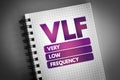 VLF - Very Low Frequency acronym on notepad, technology concept background Royalty Free Stock Photo