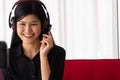 Vlog Asian woman blogger influencer sitting on the sofa in home and recording video blog for teaching and coach her Students or Royalty Free Stock Photo