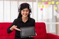 Vlog Asian woman blogger influencer sitting on the sofa in home and recording video blog for teaching and coach her Students or Royalty Free Stock Photo