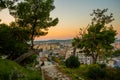 VLORA, ALBANIA: Cityscape seen from Kuzum Baba hill. Aerial city view, city panorama of Vlore at sunset. Royalty Free Stock Photo