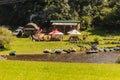 VLTAVA, CZECHIA - AUGUST 7, 2020: Tourists enjoy a stop for a refreshment during canoeing at Vltava river near Cesky