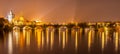 Vltava River and Charles Bridge with Old Town Bridge Tower by night, Prague, Czechia. UNESCO World Heritage Site Royalty Free Stock Photo