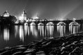 Vltava River and Charles Bridge with Old Town Bridge Tower by night, Prague, Czechia. UNESCO World Heritage Site Royalty Free Stock Photo