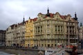 Vltava river corner with historic buildings and trams, Prague, May, 2010 Royalty Free Stock Photo