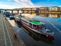 Prague. Vltava river vessel ship floating , Europe holiday vacation Coastline embankment sunrise. Prague, Czech republic