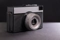 Vntage film camera on dark background withot brand