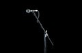 Vocal audio mic on a black background. Singer in karaokes, microphones. Live music, audio equipment, sing sound