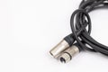 Vocal microphone xlr connection cable isolated above white background with copy space Royalty Free Stock Photo