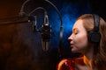 Vocalist sings in studio. Vocal and music, professional singing and skills