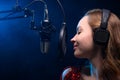 Vocalist sings in studio. Vocal and music, professional singing and skills