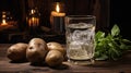Vodka Elegance: A Crystal Clear Glass Nestled Beside Fresh Potatoes