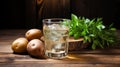 Vodka Elegance: Premium Glass Sits Beside Fresh Potatoes, Culinary Harmony