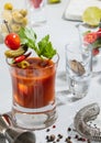 Vodka and tomato juice bloody mary cocktail mix with pepper on light background Royalty Free Stock Photo