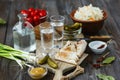 Vodka and traditional snack on wooden background Royalty Free Stock Photo