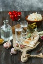 Vodka and traditional snack on wooden background Royalty Free Stock Photo