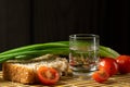 Vodka vegetables still life on the mat home russian style