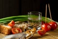 Vodka vegetables still life on the mat home russian style