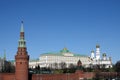 Vodovzvodnaya tower, Grand Kremlin Palace and Ivan the Great Bell Tower of Moscow Kremlin behind the wall on embankment ot the Mos Royalty Free Stock Photo