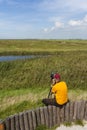 Vogelaar in Warkumerwaard; Birder at Warkumerwaard Royalty Free Stock Photo