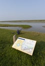 Vogelfotograaf bij het Wagenjot; Bird photographer at the Wagenjot, Texel Royalty Free Stock Photo