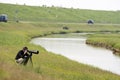 Vogelfotograaf bij het Wagenjot; Bird photographer at the Wagenjot, Texel Royalty Free Stock Photo