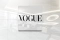 Vogue on glossy office wall realistic texture