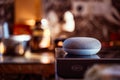 Voice controlled smart speaker in a interior kitchen. Royalty Free Stock Photo