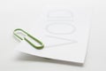 Void paper with green paper clip